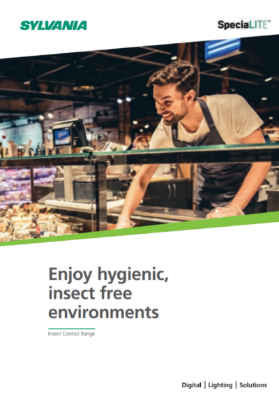 Person working behind a glass food display counter in a supermarket or deli, handling food items in a clean, well-lit environment.